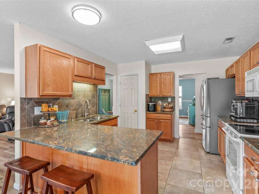 1174 Mocksville Highway, Statesville, NC 28625.  MLS# CAR4377924, YatesRealty ID 23199. 