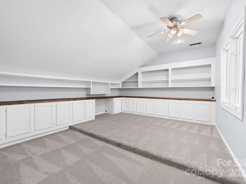 512 Saint Cloud Drive, Statesville, NC 28625.  MLS# CAR4286600, YatesRealty ID 23201. Office or playroom with built-ins.
