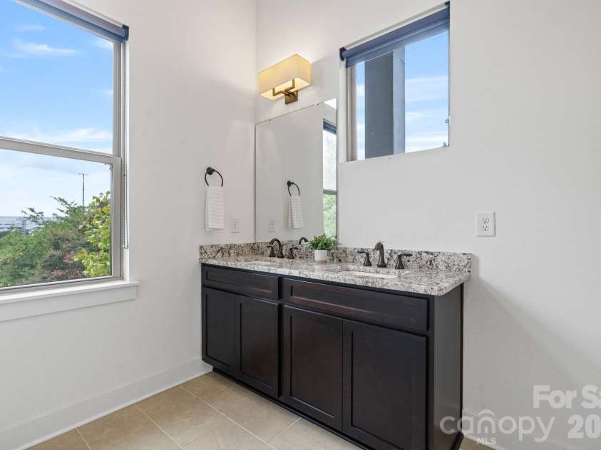 1500 Kenilworth Avenue, Charlotte, NC 28203.  MLS# CAR4381078, YatesRealty ID 23202. Dual vanity