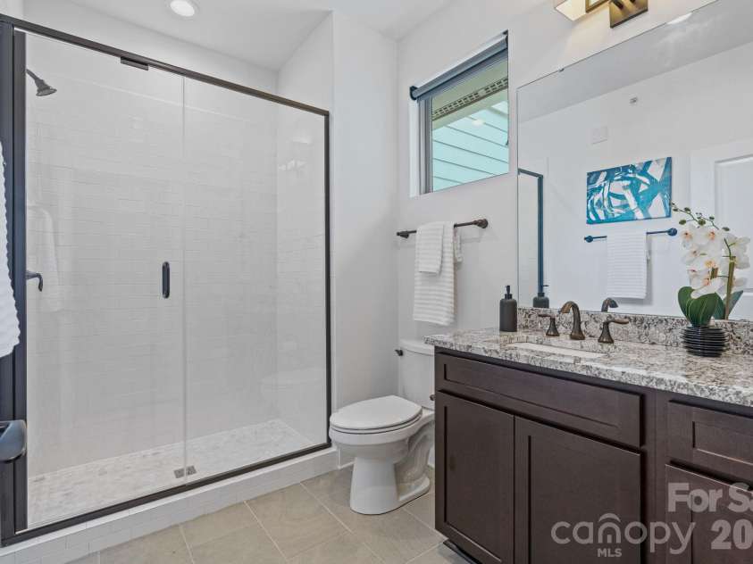 1500 Kenilworth Avenue, Charlotte, NC 28203.  MLS# CAR4381078, YatesRealty ID 23202. Large walk-in shower