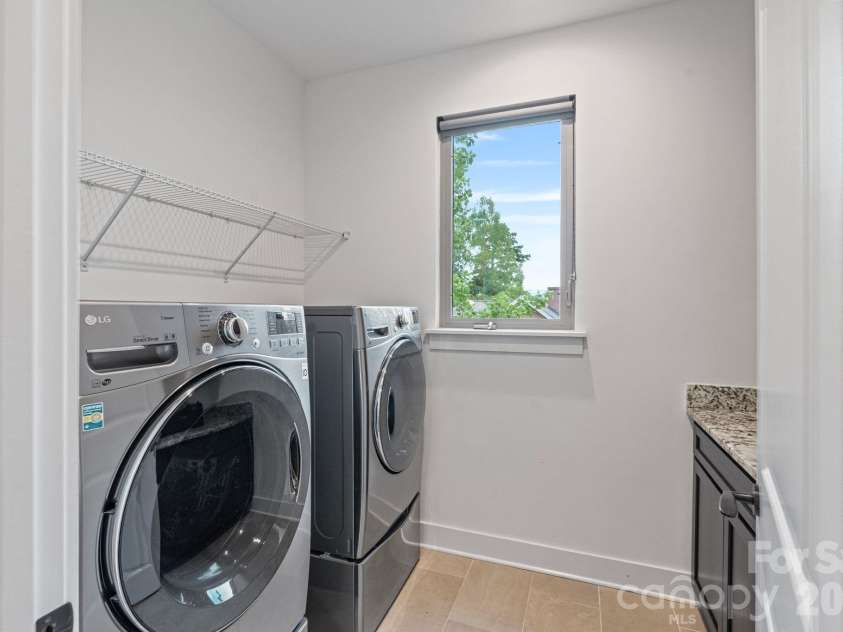 1500 Kenilworth Avenue, Charlotte, NC 28203.  MLS# CAR4381078, YatesRealty ID 23202. Laundry room on the second level.
