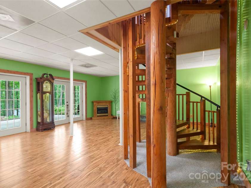 720 Potneck Road, Salisbury, NC 28147.  MLS# CAR4270437, YatesRealty ID 23205. Basement, with spiral staircase descending