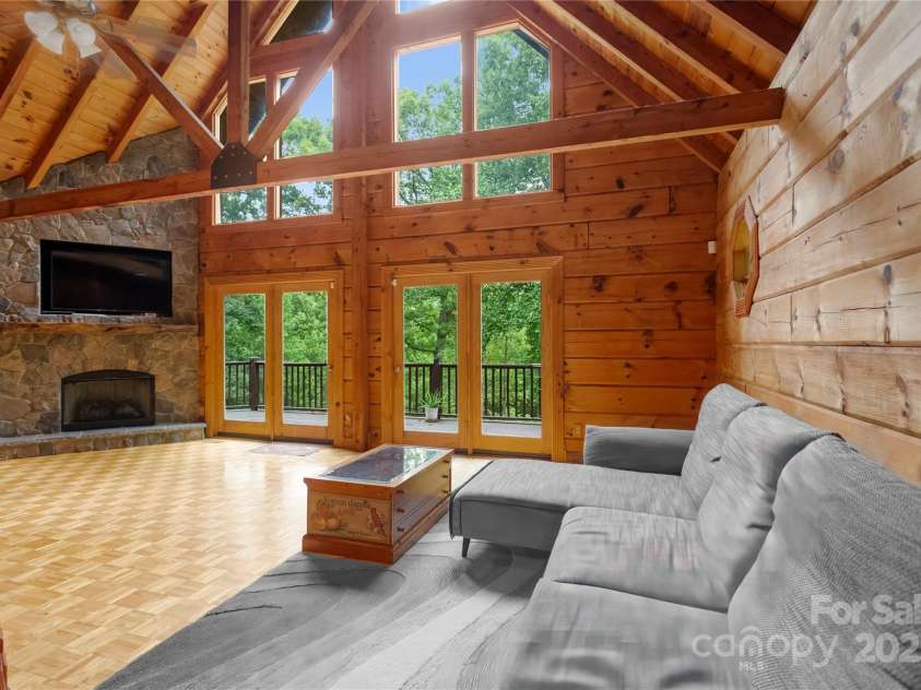 720 Potneck Road, Salisbury, NC 28147.  MLS# CAR4270437, YatesRealty ID 23205. Great room stone fireplace