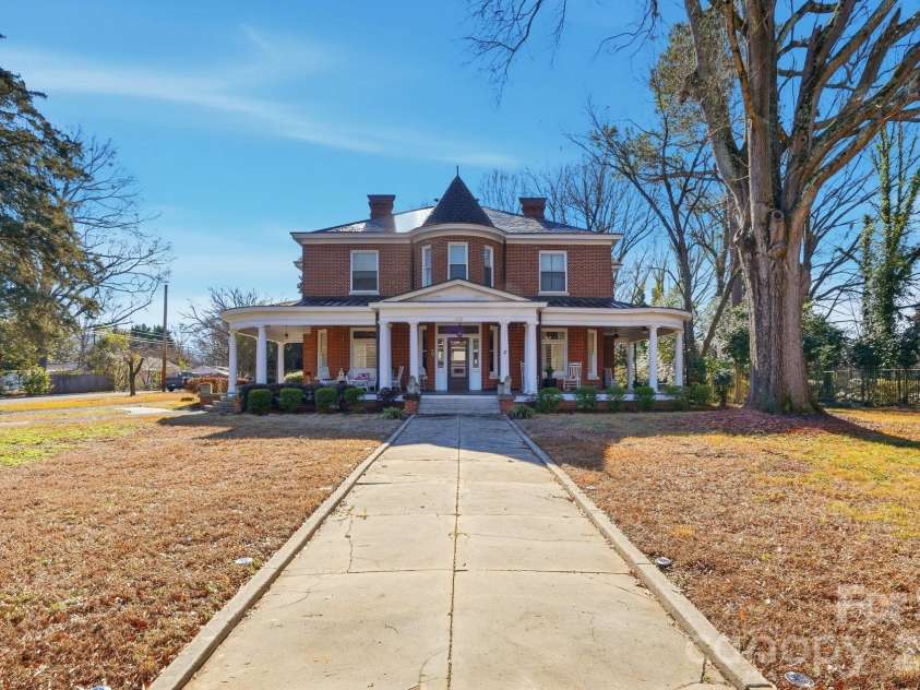 1103 Franklin Street, Monroe, NC 28112.  MLS# CAR4328672, YatesRealty ID 23215. Almost an Acre Lot
