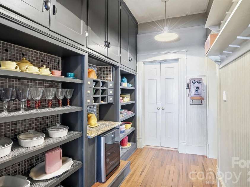 1103 Franklin Street, Monroe, NC 28112.  MLS# CAR4328672, YatesRealty ID 23215. Open Pantry & 2nd Pantry beyond the Doors