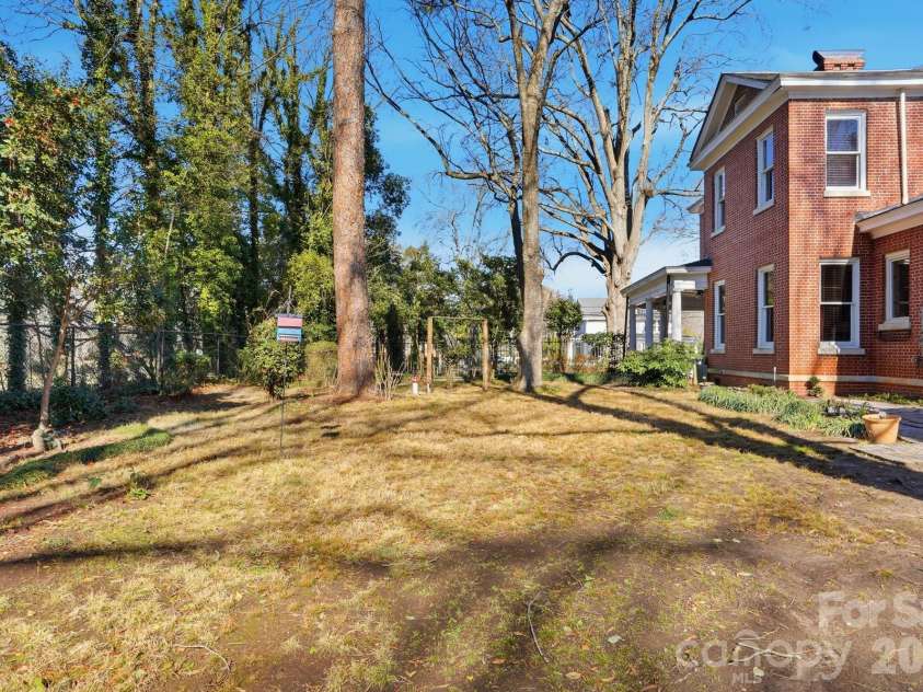 1103 Franklin Street, Monroe, NC 28112.  MLS# CAR4328672, YatesRealty ID 23215. Side Yard