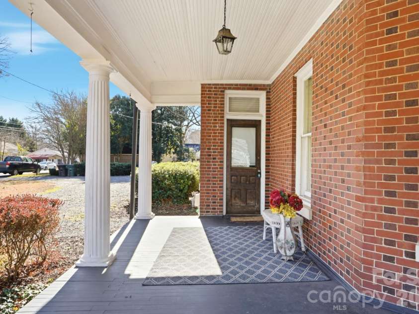 1103 Franklin Street, Monroe, NC 28112.  MLS# CAR4328672, YatesRealty ID 23215. Wrap around Porch - Left side