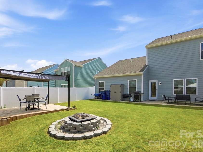 275 Redondo Drive, Wingate, NC 28174.  MLS# CAR4358477, YatesRealty ID 23217. Custom Firepit
