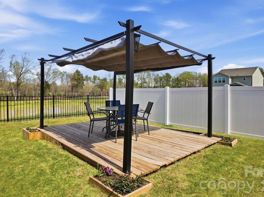 275 Redondo Drive, Wingate, NC 28174.  MLS# CAR4358477, YatesRealty ID 23217. Deck with Awning