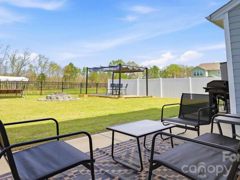275 Redondo Drive, Wingate, NC 28174.  MLS# CAR4358477, YatesRealty ID 23217. Extended Patio