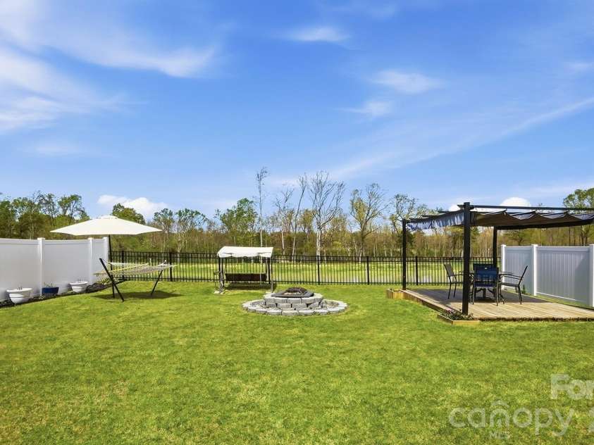 275 Redondo Drive, Wingate, NC 28174.  MLS# CAR4358477, YatesRealty ID 23217. Privacy Fence Both Sides