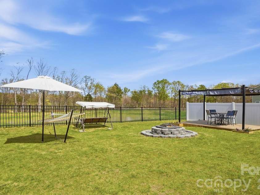 275 Redondo Drive, Wingate, NC 28174.  MLS# CAR4358477, YatesRealty ID 23217. Stunning Backyard