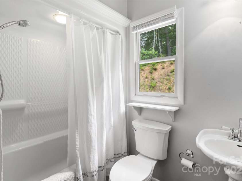 109 Paradise Circle, Clyde, NC 28721.  MLS# CAR4239920, YatesRealty ID 23219. Downstairs bath