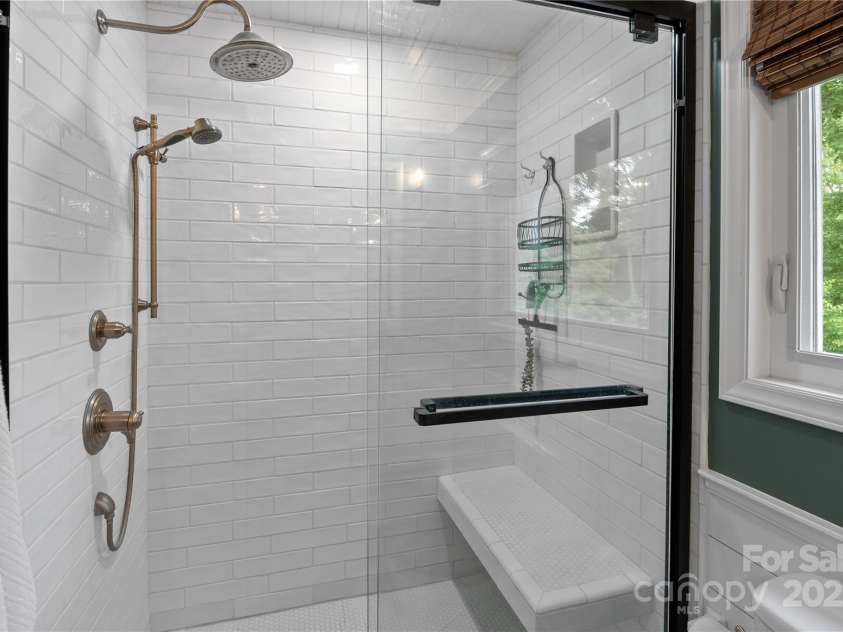109 Paradise Circle, Clyde, NC 28721.  MLS# CAR4239920, YatesRealty ID 23219. Updated ensuite bathroom