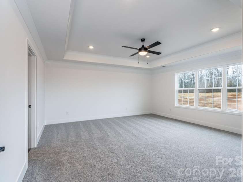 1230 Gardenia Drive, Mt Ulla, NC 28125.  MLS# CAR4299918, YatesRealty ID 23219. Primary on first floor, tray ceilings