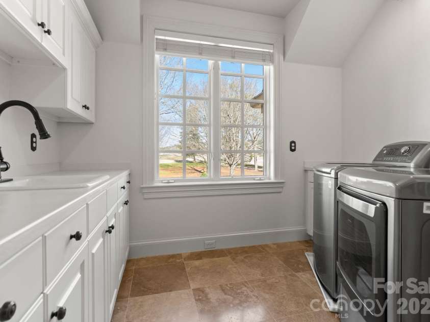 17429 Staysail Court, Cornelius, NC 28031.  MLS# CAR4337983, YatesRealty ID 2322. 2nd laundry room upstairs