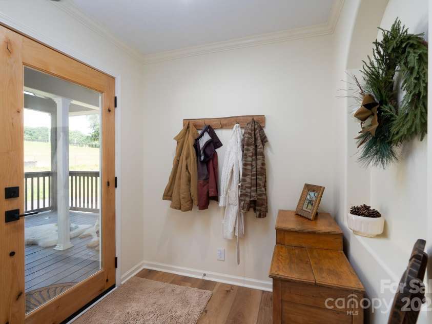 16132 Mclester Road, Oakboro, NC 28129.  MLS# CAR4263012, YatesRealty ID 23221. Beautiful foyer with new front door