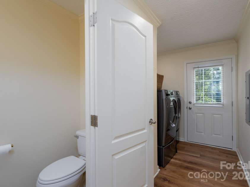 16132 Mclester Road, Oakboro, NC 28129.  MLS# CAR4263012, YatesRealty ID 23221. Half bath and laundry