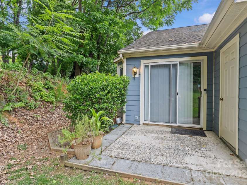 9136 Four Mile Creek Road, Charlotte, NC 28277.  MLS# CAR4276244, YatesRealty ID 23222. Back patio/ utility room