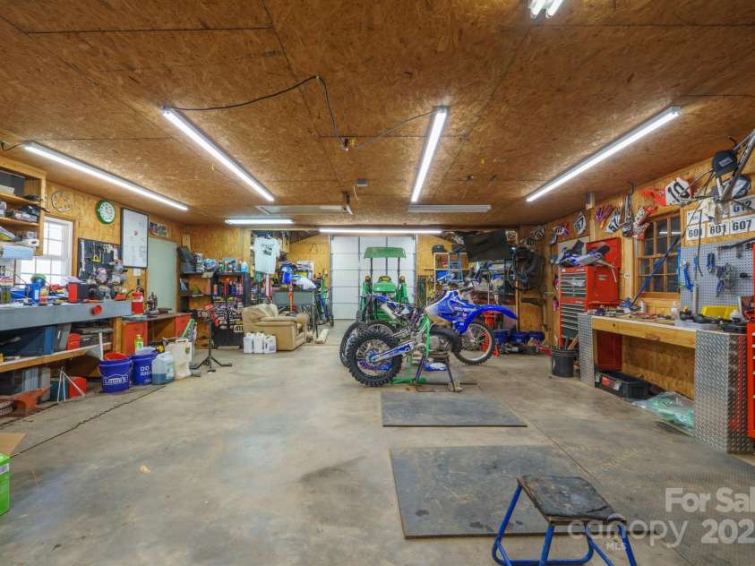 14411 Eastfield Road, Huntersville, NC 28078.  MLS# CAR4273593, YatesRealty ID 23226. Massive heated and cooled shop