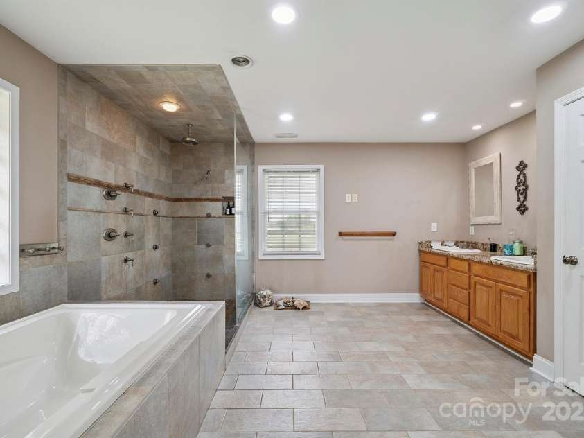 14411 Eastfield Road, Huntersville, NC 28078.  MLS# CAR4273593, YatesRealty ID 23226. Massive primary bath