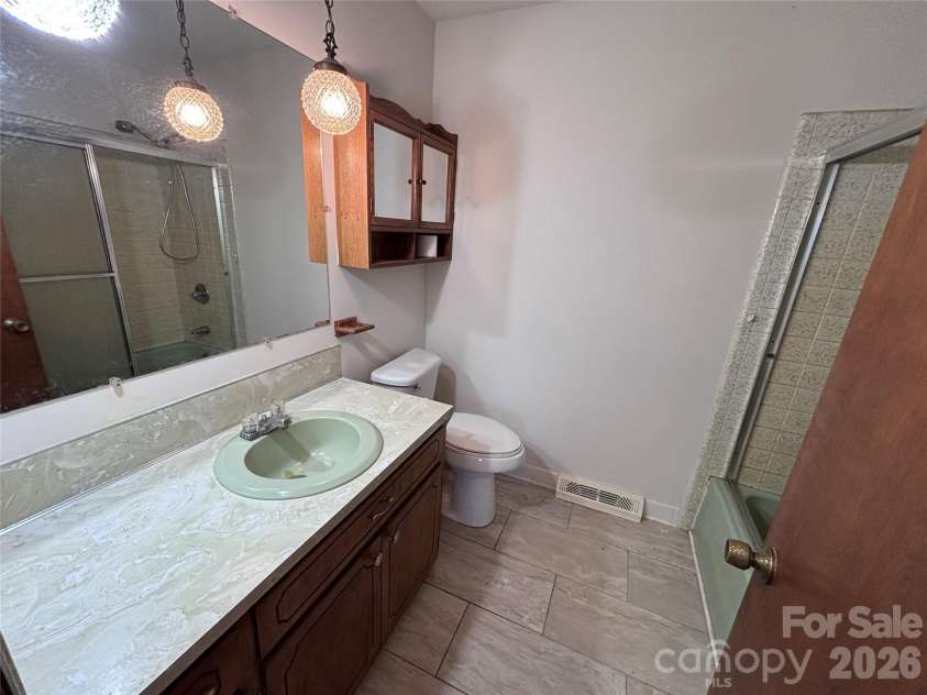 14740 Hatley Burris Road, Stanfield, NC 28163.  MLS# CAR4325104, YatesRealty ID 2323. Guest Bath