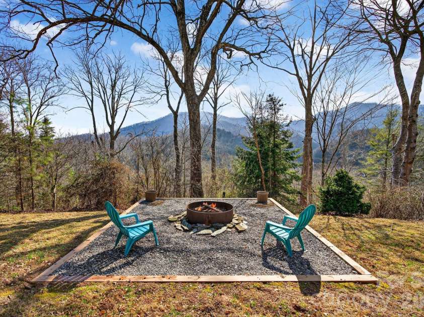 99 Margaret Drive, Leicester, NC 28748.  MLS# CAR4344574, YatesRealty ID 2323. Firepit