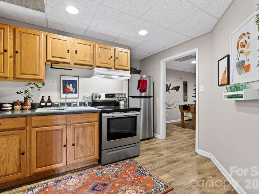 99 Margaret Drive, Leicester, NC 28748.  MLS# CAR4344574, YatesRealty ID 2323. Kitchen Downstairs