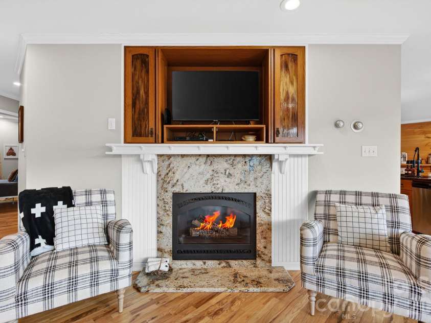 99 Margaret Drive, Leicester, NC 28748.  MLS# CAR4344574, YatesRealty ID 2323. Living Area with Fireplace