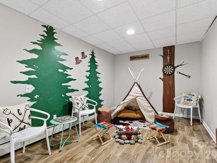 99 Margaret Drive, Leicester, NC 28748.  MLS# CAR4344574, YatesRealty ID 2323. Play Room Downstairs