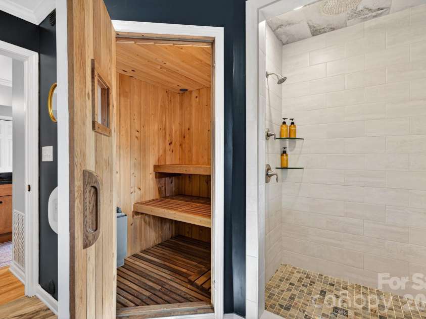 99 Margaret Drive, Leicester, NC 28748.  MLS# CAR4344574, YatesRealty ID 2323. Primary Bath Sauna