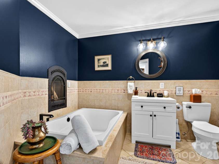 99 Margaret Drive, Leicester, NC 28748.  MLS# CAR4344574, YatesRealty ID 2323. Primary Bath with Soaking Tub