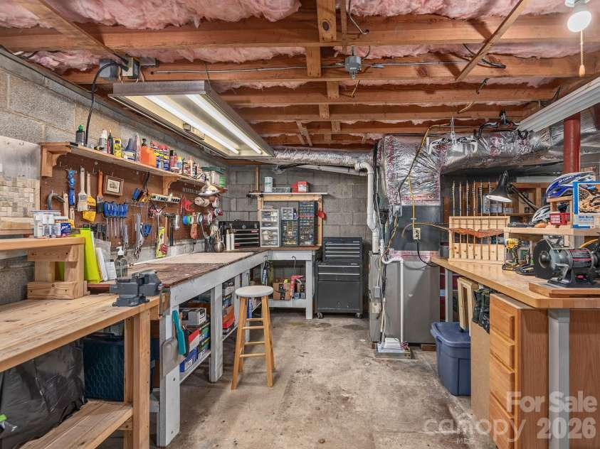 33 Pinehurst Road, Asheville, NC 28805.  MLS# CAR4374553, YatesRealty ID 23231. Basement Workspace with Built in Storage