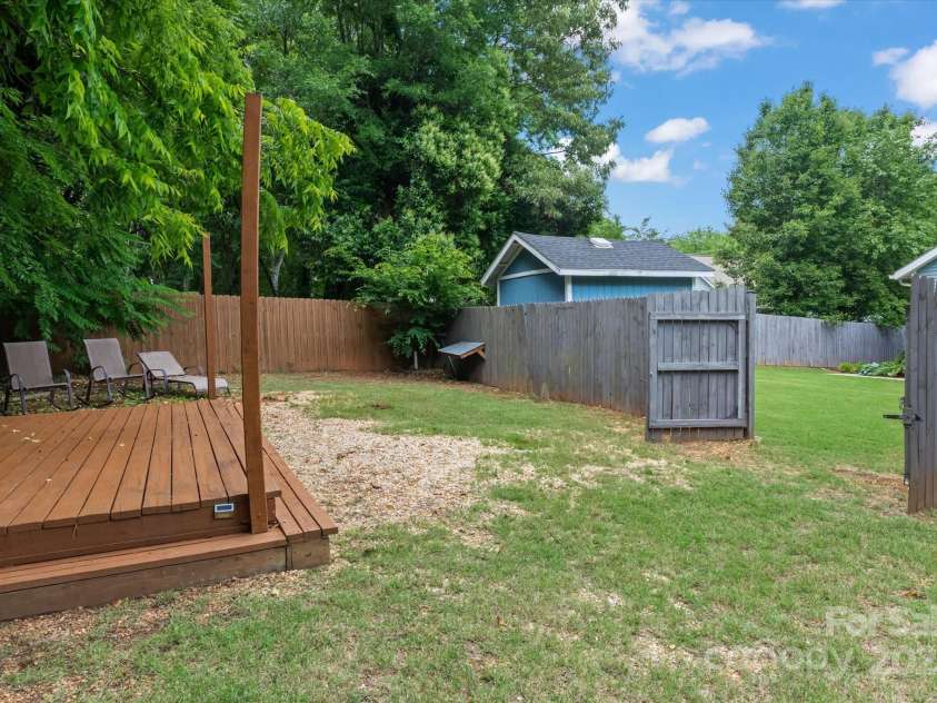 1201 Pegram Street, Charlotte, NC 28205.  MLS# CAR4257783, YatesRealty ID 23234. Gate on site street can be used for additional parking or if you are looking to build a detached garage, apartment/bonus area above the garage so many possible uses