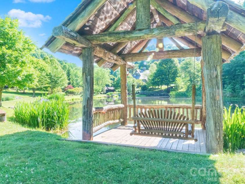17 Greer Way, Mars Hill, NC 28754.  MLS# CAR4370316, YatesRealty ID 23237. Stocked trout pond