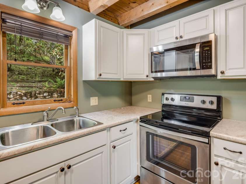 17 Greer Way, Mars Hill, NC 28754.  MLS# CAR4370316, YatesRealty ID 23237. View of backyard