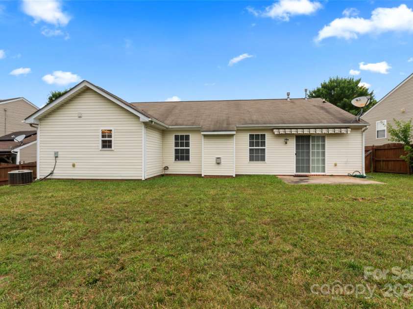 7616 Shiny Meadow Lane, Charlotte, NC 28215.  MLS# CAR4275110, YatesRealty ID 23237. Large fenced-in backyard