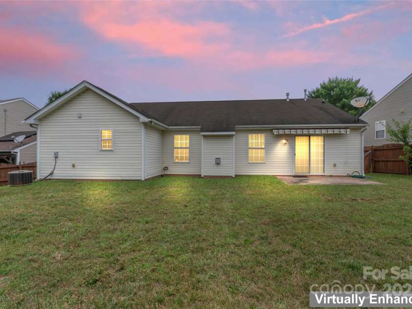 7616 Shiny Meadow Lane, Charlotte, NC 28215.  MLS# CAR4275110, YatesRealty ID 23237. Large fenced-in backyard