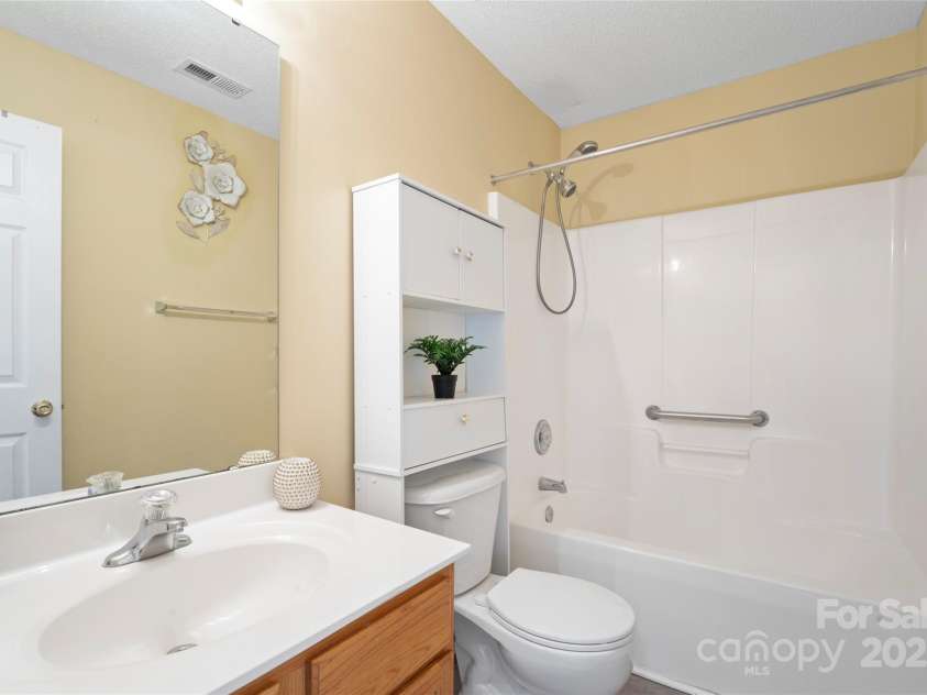 7616 Shiny Meadow Lane, Charlotte, NC 28215.  MLS# CAR4275110, YatesRealty ID 23237. Second bathroom