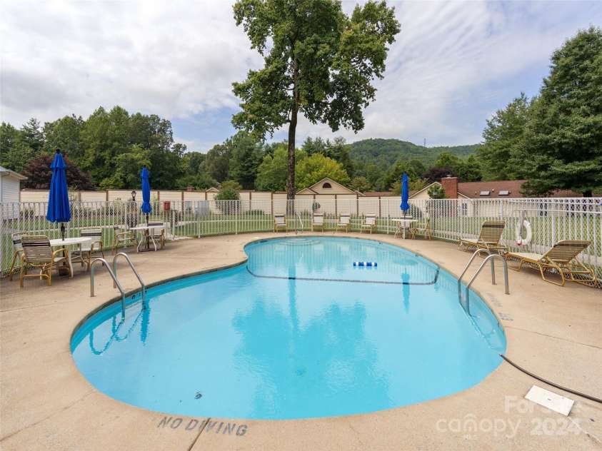 312 Somerton Court, Hendersonville, NC 28791.  MLS# CAR4207228, YatesRealty ID 2324. Clubhouse pool