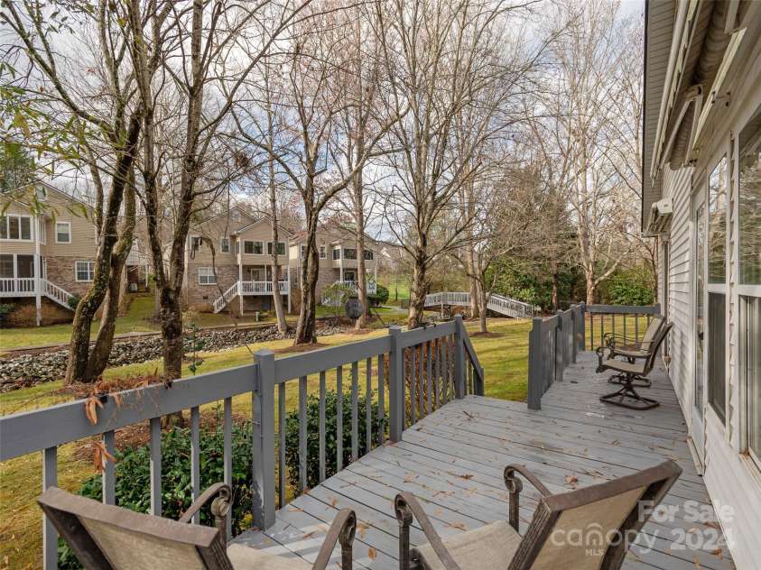 312 Somerton Court, Hendersonville, NC 28791.  MLS# CAR4207228, YatesRealty ID 2324. Creekside deck
