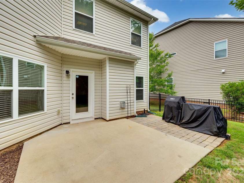 424 Castlebury Court, Clover, SC 29710.  MLS# CAR4265807, YatesRealty ID 23240. Back patio