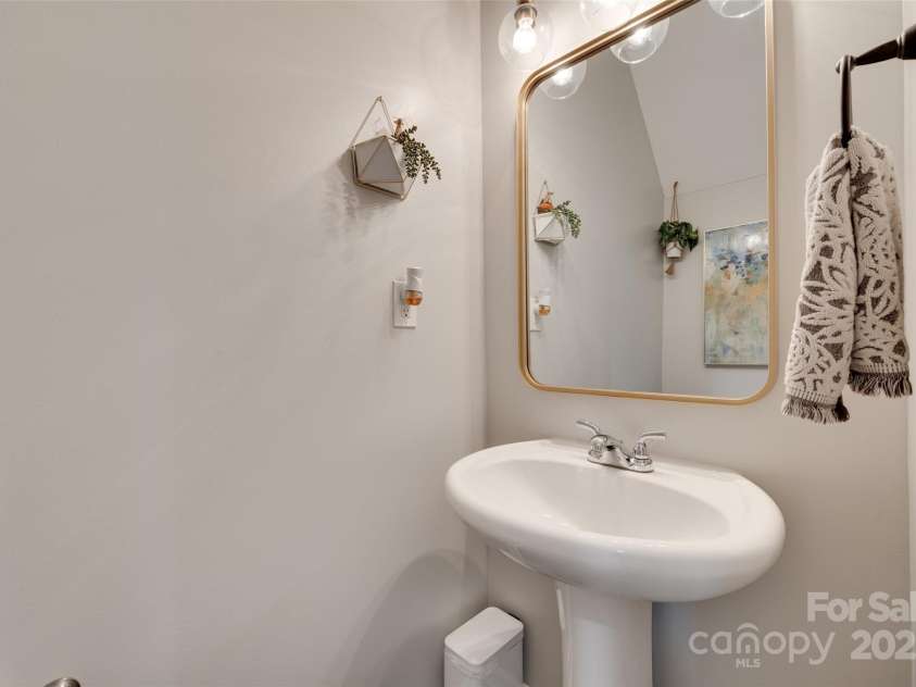 424 Castlebury Court, Clover, SC 29710.  MLS# CAR4265807, YatesRealty ID 23240. Downstairs half bath.