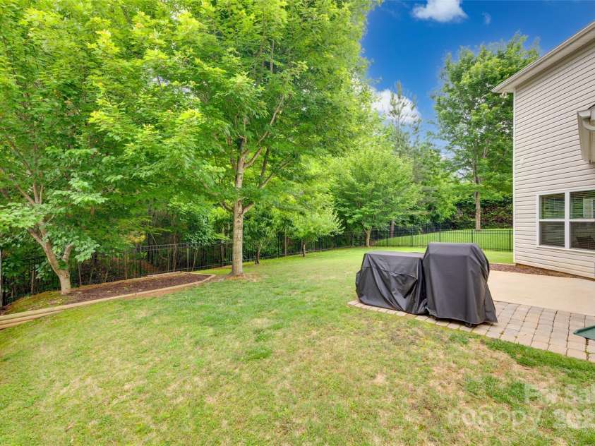 424 Castlebury Court, Clover, SC 29710.  MLS# CAR4265807, YatesRealty ID 23240. Fully fenced backyard.