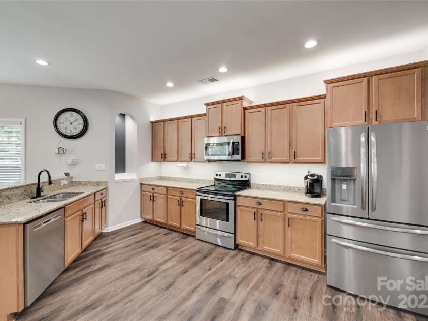 424 Castlebury Court, Clover, SC 29710.  MLS# CAR4265807, YatesRealty ID 23240. Massive kitchen, lots of cabinets and upgraded can lighting.