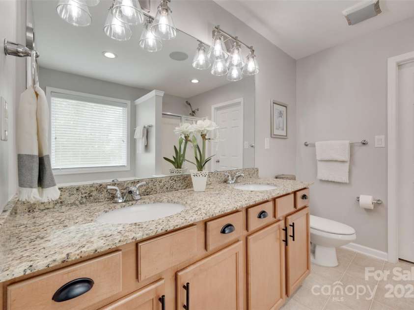 424 Castlebury Court, Clover, SC 29710.  MLS# CAR4265807, YatesRealty ID 23240. Primary bath w/ double vanity.