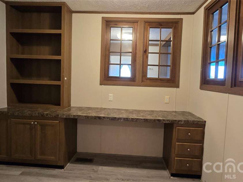78 Buck Branch Road, Mill Spring, NC 28756.  MLS# CAR4381478, YatesRealty ID 23248. Ideal home office space