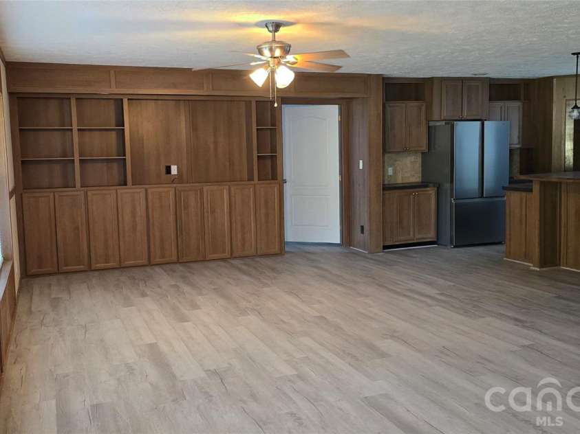 78 Buck Branch Road, Mill Spring, NC 28756.  MLS# CAR4381478, YatesRealty ID 23248. Large open livingroom