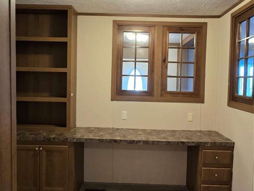 78 Buck Branch Road, Mill Spring, NC 28756.  MLS# CAR4381478, YatesRealty ID 23248. Office with built ins