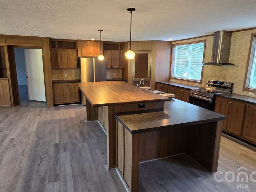 78 Buck Branch Road, Mill Spring, NC 28756.  MLS# CAR4381478, YatesRealty ID 23248. Open floor plan